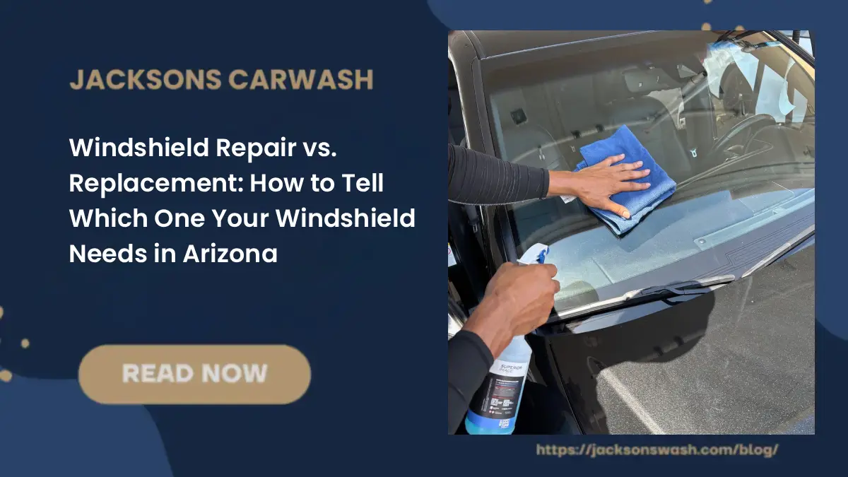 Jacksons technician wiping a black car's windshield with a microfiber towel and glass cleaner in Phoenix, AZ